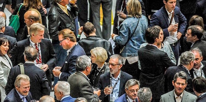 web1_FMNetworking.Meeting.1200×450-copy-copy A group of business professionals during a networking event.