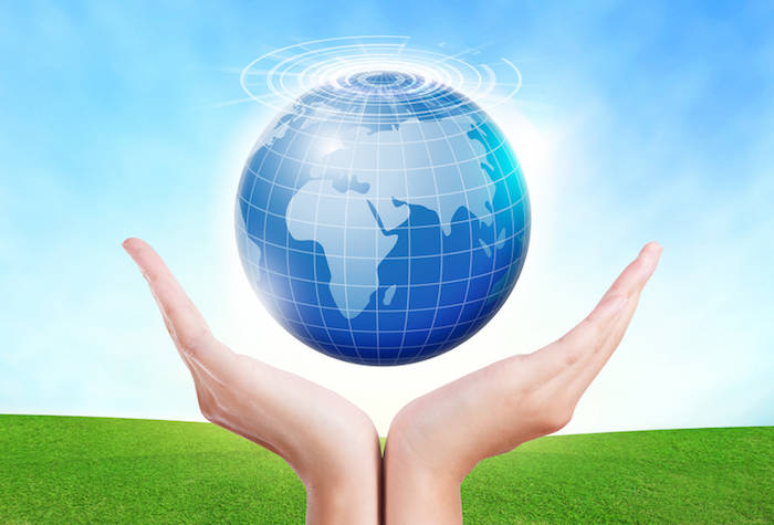 web1_dreamstime_s_57476063 hands holding the world